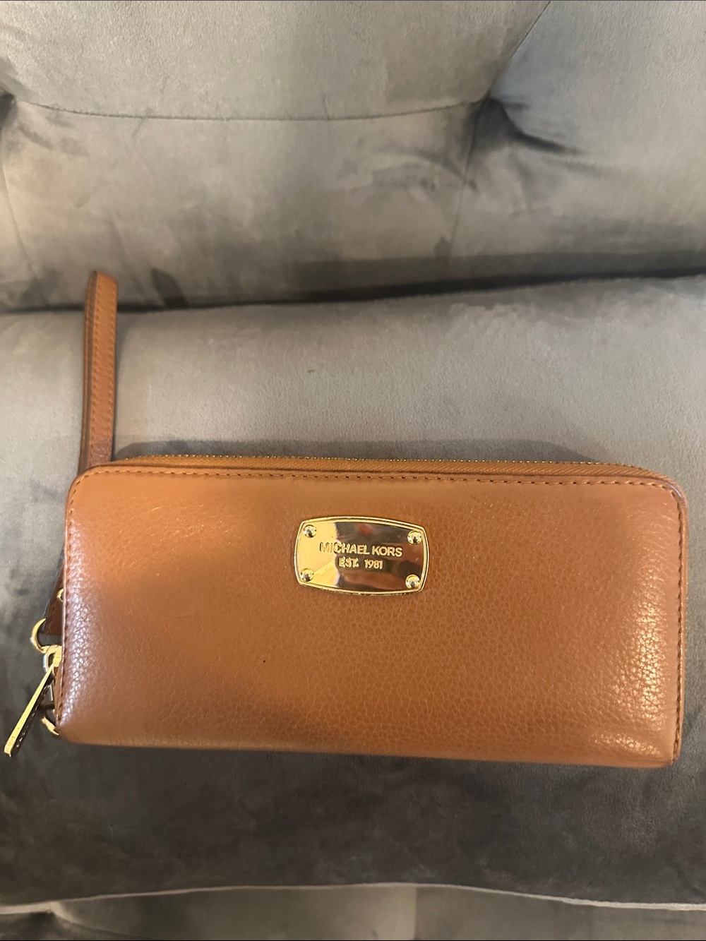 Michael Kors Cognac Leather Zip Wristlet with Gold Plaque